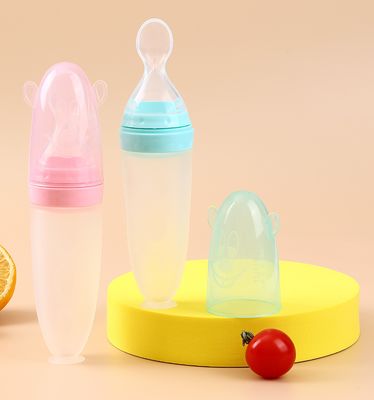 good price Baby silicone rice cereal spoon milk bottle squeeze feeding spoon child silicone feeding bottle with spoon for baby online